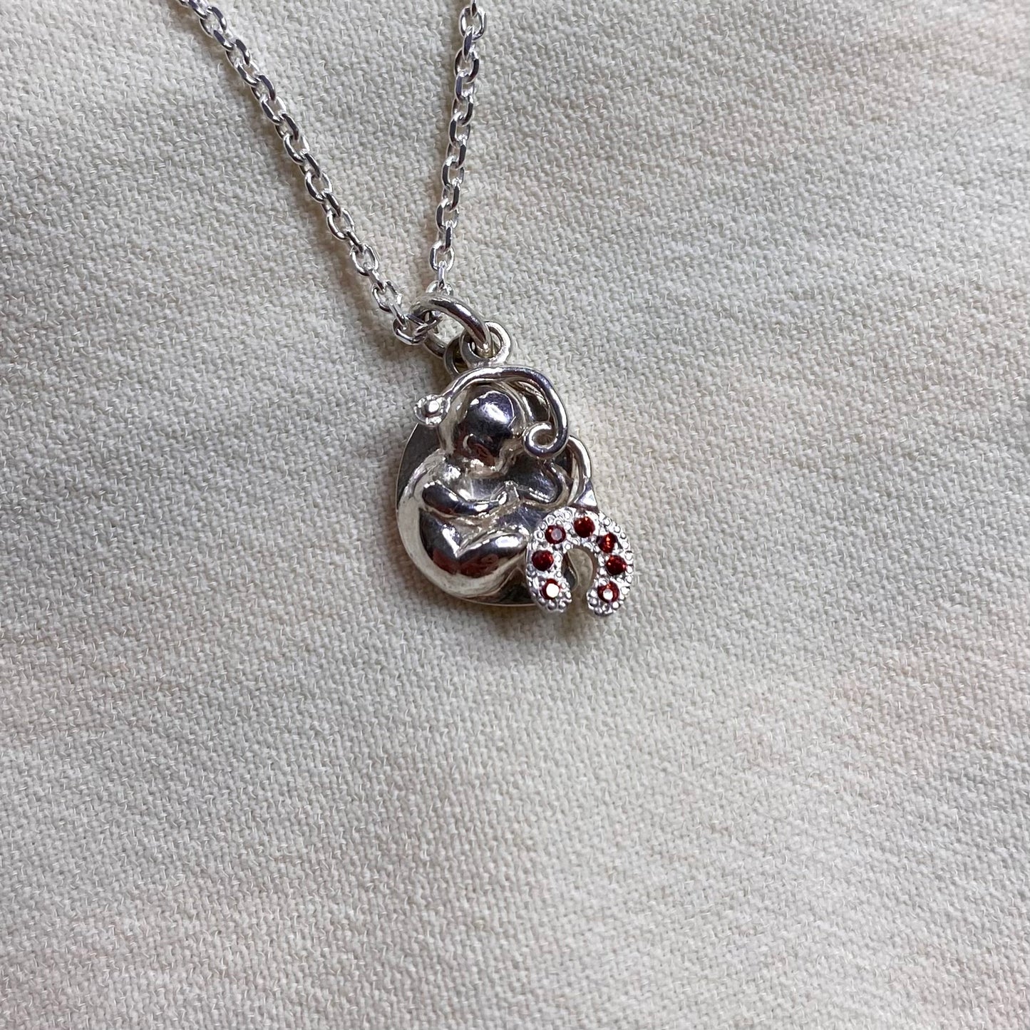 Collana bimbo in grembo e fonendoscopio per Ostetricia