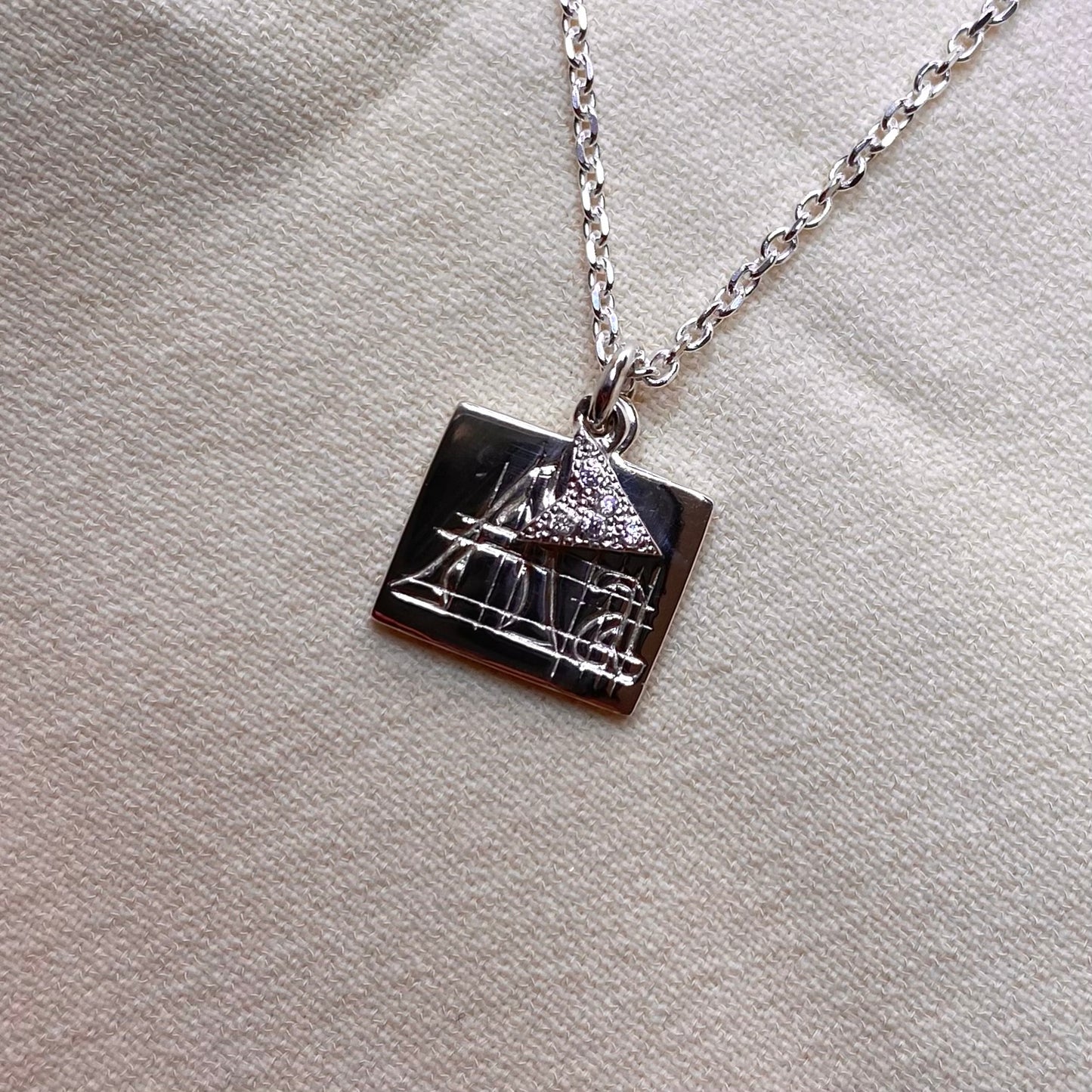 Ciondolo targhetta e puntatore per Design