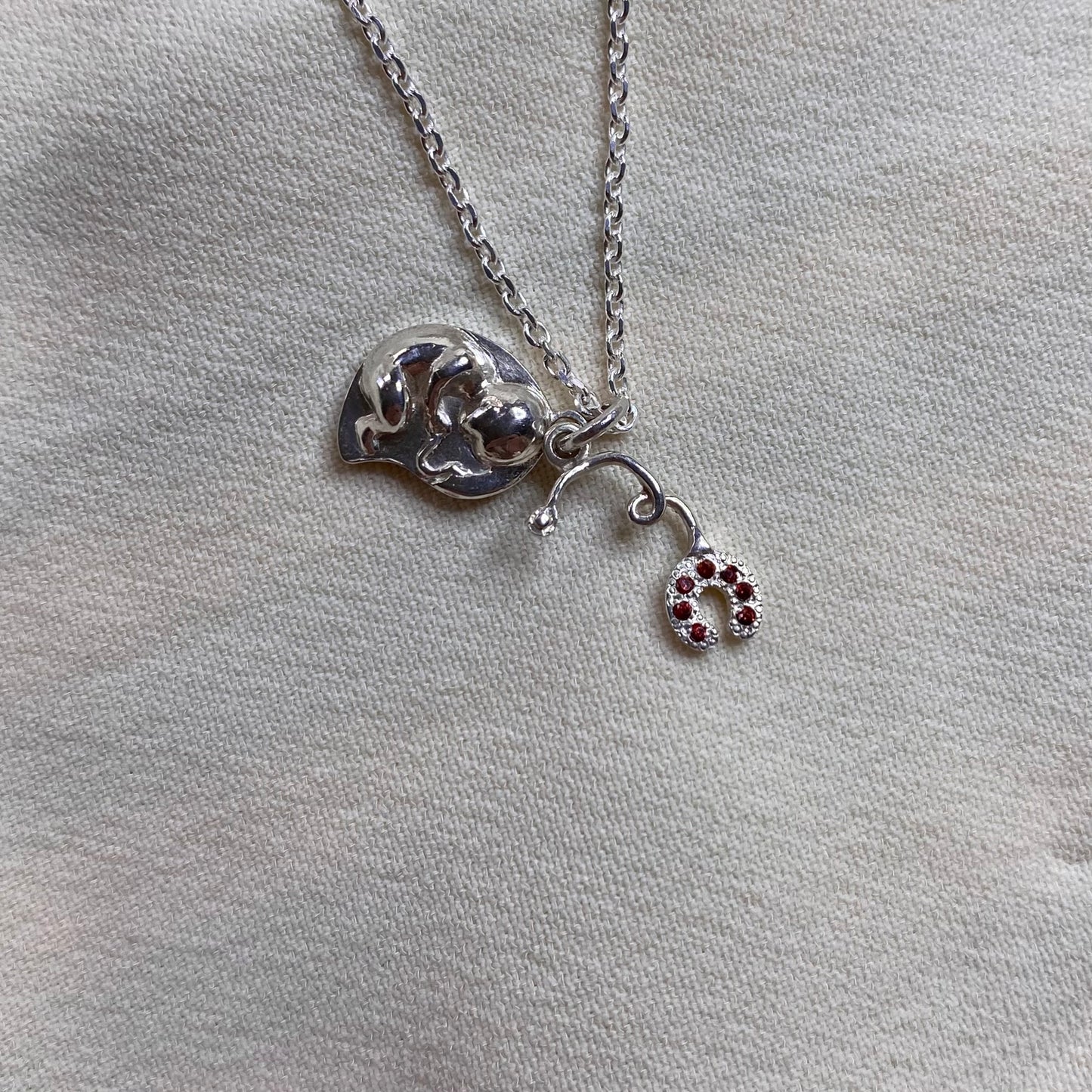 Collana bimbo in grembo e fonendoscopio per Ostetricia