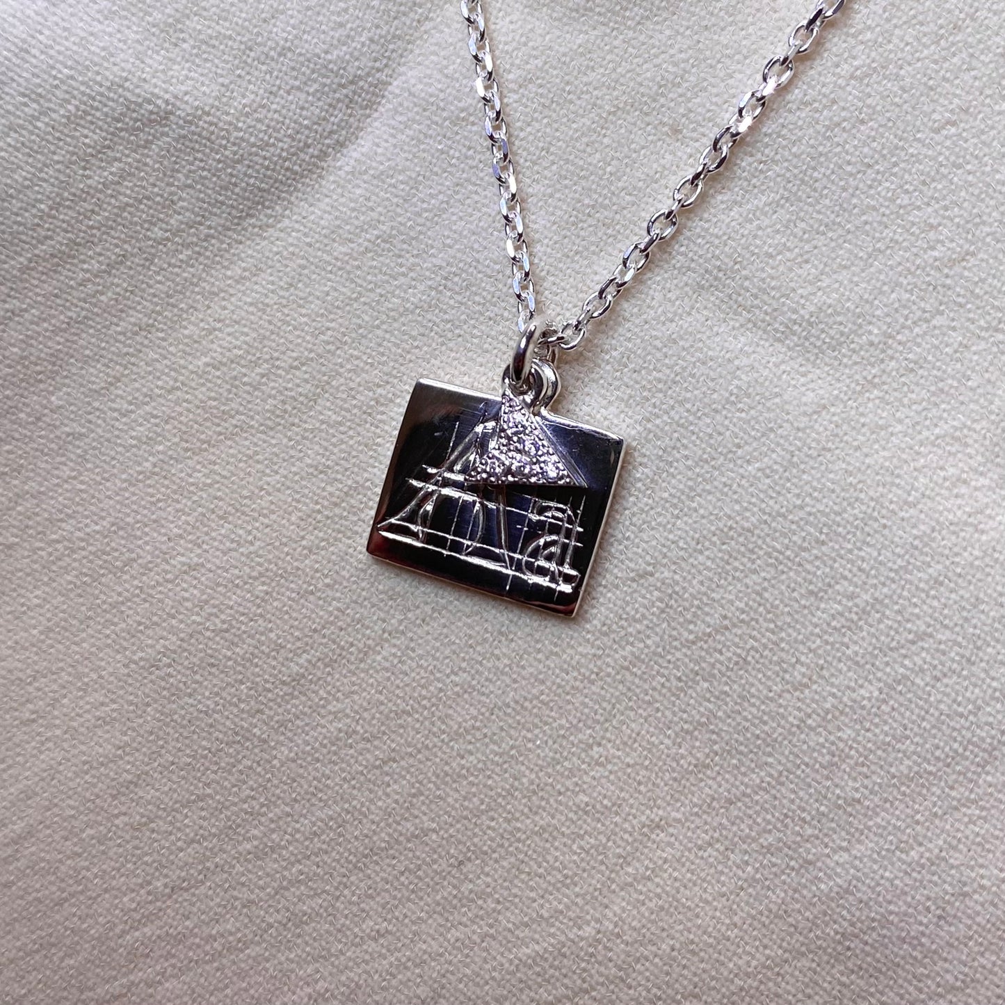 Ciondolo targhetta e puntatore per Design